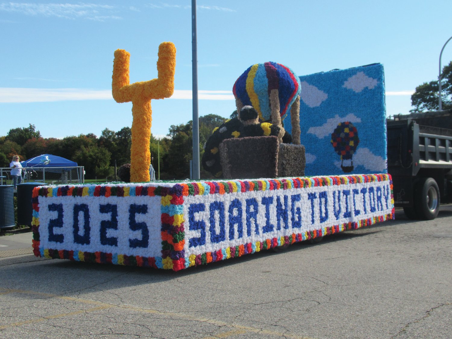 “Soaring to Victory” amid a hot air balloon was the Johnston High Class of 2025’s floats entry.